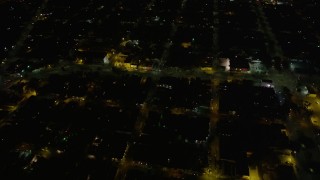 5K aerial stock footage urban homes around St. Claude Avenue and Elysian Fields Avenue at night, Gentilly New Orleans, Louisiana Aerial Stock Footage | AX62_046