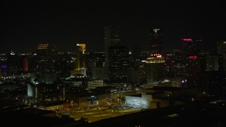 5K aerial stock footage flyby hotels and skyscrapers in Downtown New Orleans at night, Louisiana Aerial Stock Footage | AX63_017