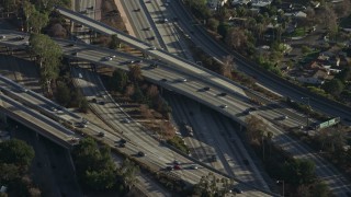 AX64_0010E - 5K aerial stock footage of traffic on Highway 170 and Highway 134 freeway Interchange in North Hollywood, California