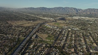 5K aerial stock footage fly over suburban homes to approach Highway 170 / I-5 freeway split in Sun Valley, California Aerial Stock Footage | AX64_0032