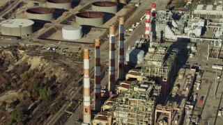 AX64_0038E - 5K aerial stock footage of LADWP Valley Generating Station smoke stacks, Sun Valley, California