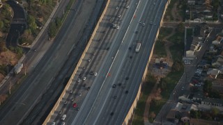 AX64_0057 - 5K aerial stock footage of bird's eye of light traffic on Interstate 5 freeway, Burbank, California