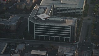 5K aerial stock footage approach office building with helipad on the rooftop in Burbank, California Aerial Stock Footage | AX64_0060E