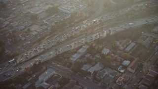 5K aerial stock footage of heavy traffic on Highway 101 in East Hollywood, Los Angeles California sunset Aerial Stock Footage | AX64_0110E