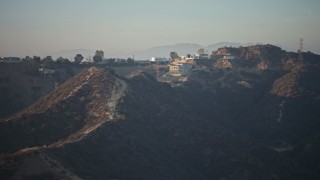 5K aerial stock footage of mansions in Hollywood Hills, California, Sunset Aerial Stock Footage | AX64_0120