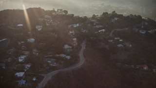 5K aerial stock footage flyby luxury homes in the Hollywood Hills, California, sunset Aerial Stock Footage | AX64_0125E