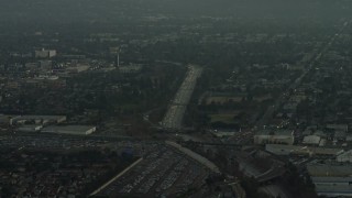 5K aerial stock footage of Highway 170, suburban homes, and large parking lot, North Hollywood, California, sunset Aerial Stock Footage | AX64_0146E