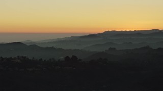 5K aerial stock footage of hilltop mansions in the Hollywood Hills, Los Angeles, California, twilight Aerial Stock Footage | AX64_0160