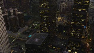 5K aerial stock footage flyby skyscrapers to reveal the public library and 5th Street in Downtown Los Angeles, California, twilight Aerial Stock Footage | AX64_0208E