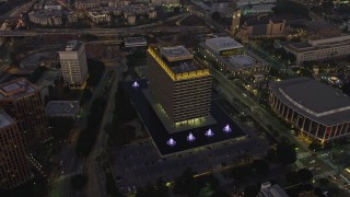 5K aerial stock footage of LADWP office building and concert halls, Downtown Los Angeles, California, twilight Aerial Stock Footage | AX64_0210E