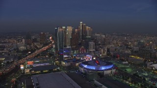 5K aerial stock footage of Staples Center, Ritz-Carlton, and Downtown Los Angeles skyscrapers, California, twilight Aerial Stock Footage | AX64_0221E