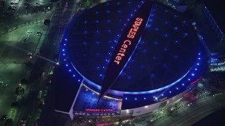 AX64_0271E - 5K aerial stock footage approach Staples Center and Nokia Theater in Downtown Los Angeles, California, night