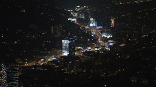 5K aerial stock footage of approaching the Sunset Strip in West Hollywood, California, night Aerial Stock Footage | AX64_0325E