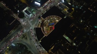 AX64_0332 - 5K aerial stock footage of 8000 Sunset shopping mall in West Hollywood, Los Angeles, California, night