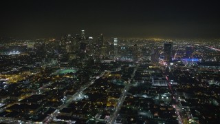 5K aerial stock footage of Downtown Los Angeles' towering skyscrapers and city sprawl, California, night Aerial Stock Footage | AX64_0376E