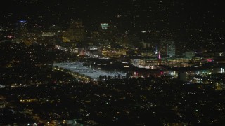 AX64_0422E - 5K aerial stock footage of the Glendale Galleria shopping mall at night, Glendale, Los Angeles, California