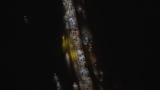 5K aerial stock footage of a bird's eye view of heavy traffic on Interstate 5, Glendale, California, night Aerial Stock Footage | AX64_0425