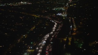 5K aerial stock footage of following traffic on Interstate 5 freeway, Sun Valley, California, night Aerial Stock Footage | AX64_0434E