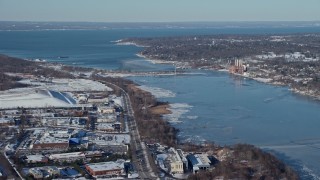 4.8K aerial stock footage of Hempstead Harbor and snow covered neighborhoods, Glenwood Landing, New York Aerial Stock Footage | AX66_0028