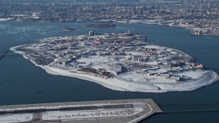 4.8K aerial stock footage video of the prison on Rikers Island in snow New York Aerial Stock Footage | AX66_0047