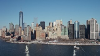 4.8K aerial stock footage approach Battery Park in snow in Lower Manhattan, New York City Aerial Stock Footage | AX66_0135E