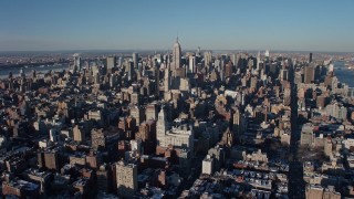 4.8K aerial stock footage of a wide view of Midtown Manhattan skyscrapers in the distance, New York City Aerial Stock Footage | AX66_0179E