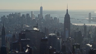 4.8K aerial stock footage of the Empire State Building and Lower Manhattan skyscrapers, New York City Aerial Stock Footage | AX66_0208