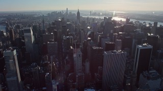 4.8K aerial stock footage flyby Midtown Manhattan skyscrapers in winter, New York City Aerial Stock Footage | AX66_0209