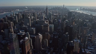 4.8K aerial stock footage of Midtown, with Lower Manhattan in background in winter, New York City Aerial Stock Footage | AX66_0212