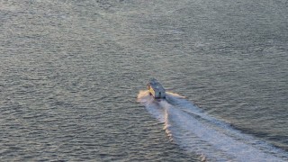 4.8K aerial stock footage of a ferry in New York Harbor at sunset Aerial Stock Footage | AX66_0237