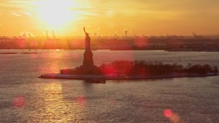 4.8K aerial stock footage of the Statue of Liberty, New York City, sunset Aerial Stock Footage | AX66_0258E