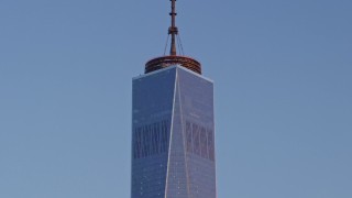 4.8K aerial stock footage tilt down the side of One World Trade Center, Lower Manhattan, New York City, sunset Aerial Stock Footage | AX66_0265