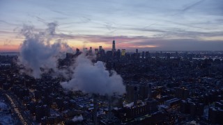 4.8K aerial stock footage of a wide view of Lower Manhattan in winter, New York City, twilight Aerial Stock Footage | AX66_0354E