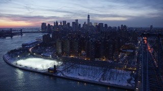 4.8K aerial stock footage of Williamsburg Bridge, Lower East Side, Lower Manhattan in winter, New York City, twilight Aerial Stock Footage | AX66_0360E