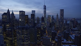 4.8K aerial stock footage of Lower Manhattan skyscrapers in winter, New York City, twilight Aerial Stock Footage | AX66_0368