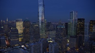 4.8K aerial stock footage of One World Trade Center and Memorial in winter, New York City, twilight Aerial Stock Footage | AX66_0380E