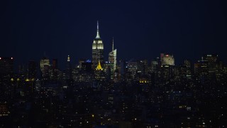 4.8K aerial stock footage of Midtown Manhattan skyscrapers, New York City, night Aerial Stock Footage | AX66_0408