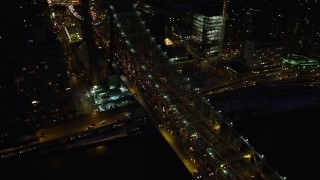 4.8K aerial stock footage of Queensboro Bridge and Midtown Manhattan skyscrapers, New York City, night Aerial Stock Footage | AX66_0422