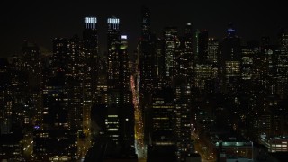 4.8K aerial stock footage view of flying by Hell's Kitchen and Upper West Side at night, New York Aerial Stock Footage | AX67_0056