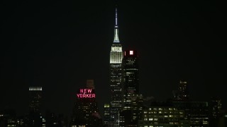 4.8K aerial stock footage view of flying by Empire State Building at night, New York Aerial Stock Footage | AX67_0061