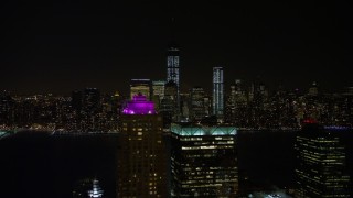 4.8K aerial stock footage view of World Trade Center and Freedom Tower seen from Jersey City at night, New York Aerial Stock Footage | AX67_0070