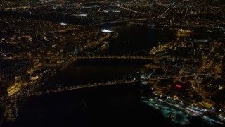 4.8K aerial stock footage view of approaching Brooklyn Bridge, Manhattan Bridge at night, New York Aerial Stock Footage | AX67_0096