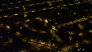 4.8K aerial stock footage view of a bird's eye view of residential neighborhoods in Queens at night, New York Aerial Stock Footage | AX67_0114