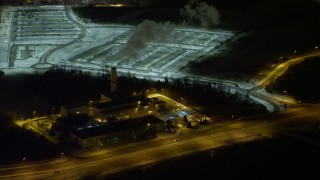 4.8K aerial stock footage view orbiting a power plant at night, Long Island, New York Aerial Stock Footage | AX67_0115