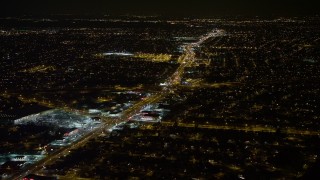 4.8K aerial stock footage view approach a busy street through residential neighborhoods, Long Island, New York Aerial Stock Footage | AX67_0117