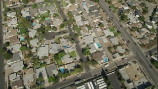 4.8K aerial stock footage bird's eye view of suburban homes, revealing I-5 and street intersection in Sun Valley, California Aerial Stock Footage | AX68_002