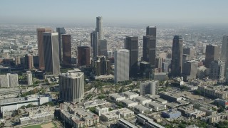 AX68_012 - 4.8K aerial stock footage tilt from Belmont High School to reveal Downtown Los Angeles, California