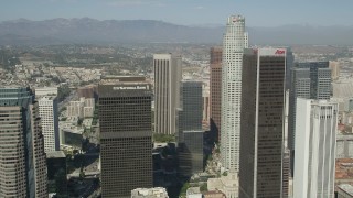 4.8K aerial stock footage fly between City National Plaza and Aon Center to approach US Bank Tower in Downtown Los Angeles, California Aerial Stock Footage | AX68_023