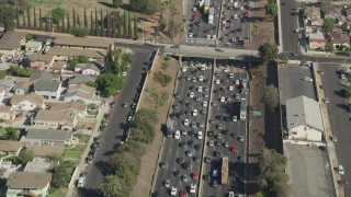 4.8K aerial stock footage of a bird's eye view of heavy freeway traffic on Interstate 5 in Boyle Heights, Los Angeles, California Aerial Stock Footage | AX68_032