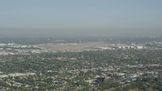 AX68_047 - 4.8K aerial stock footage of a view of Long Beach Airport in California